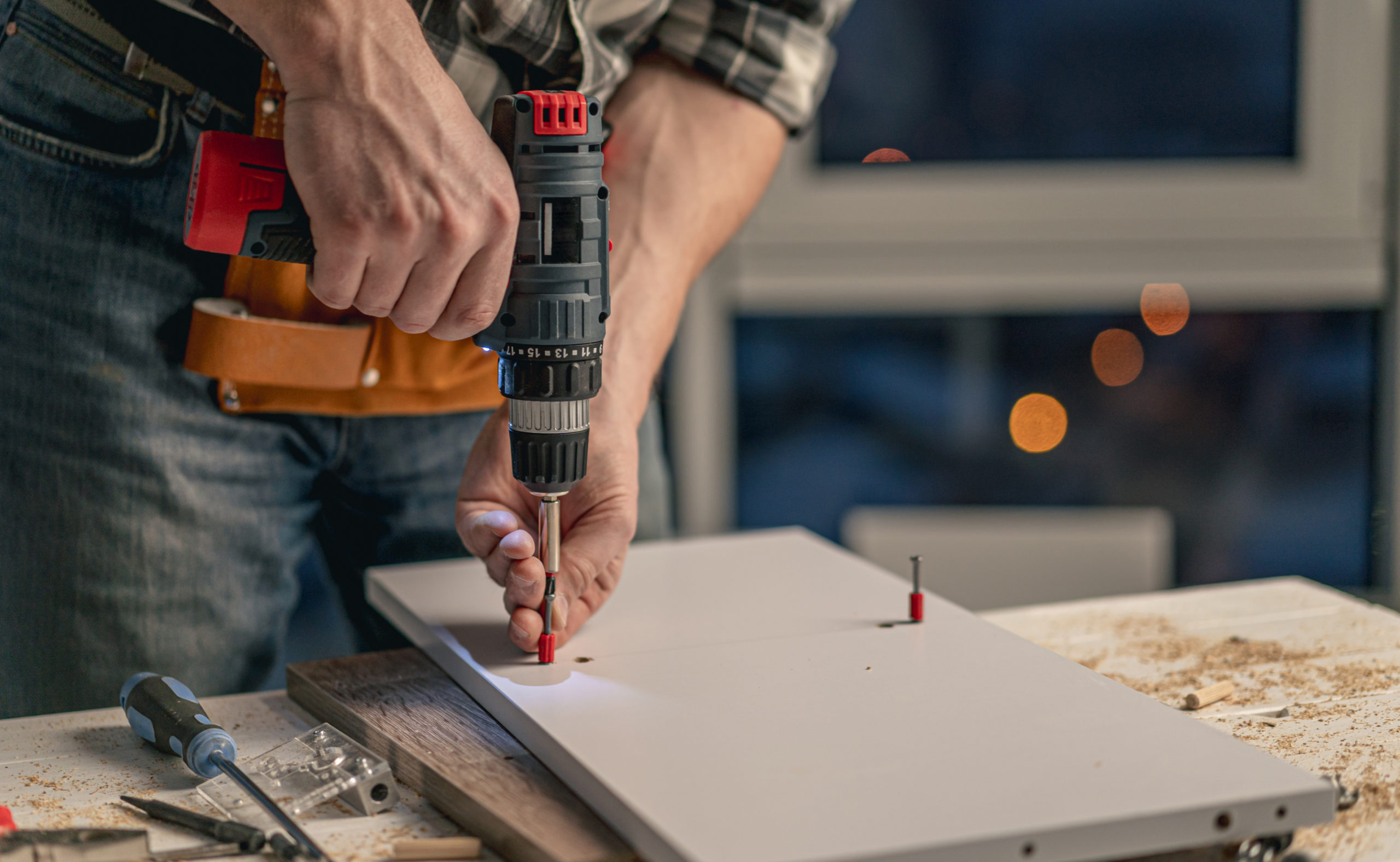 Man working during process of furniture manufacturing